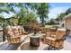 Enjoy the outdoors on this deck featuring comfortable seating and fire pit at 7302 Upham Ct, Arvada, CO 80003