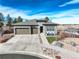 Luxury home with a large yard and driveway at 7899 S Jackson Gap St, Aurora, CO 80016