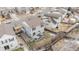 Aerial view of house showcasing backyard deck, fenced yard, and surrounding neighborhood at 1943 Morningview Ln, Castle Rock, CO 80109