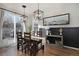 Dining room with farmhouse table and chairs, and a view to backyard at 1943 Morningview Ln, Castle Rock, CO 80109