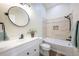 Updated bathroom with bathtub and modern fixtures at 10579 Cherry St, Thornton, CO 80233