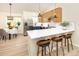 Modern kitchen with stainless steel appliances and a dining area at 10579 Cherry St, Thornton, CO 80233