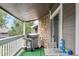 Private patio with grill and outdoor seating, perfect for entertaining at 18105 E Ohio Ave # 201, Aurora, CO 80017