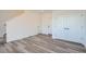 Spacious entryway with wood-look floors and double closets at 378 N. Geneva, Aurora, CO 80010