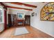 Living room featuring hardwood floors, fireplace, and built-in shelving at 2891 Canyon Crest Dr, Highlands Ranch, CO 80126