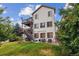 Two-story home with deck, stairs, and backyard at 2891 Canyon Crest Dr, Highlands Ranch, CO 80126