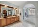 Bathroom with double vanity and marble bathtub at 2891 Canyon Crest Dr, Highlands Ranch, CO 80126