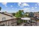 Deck with table and chairs, offering city views at 2891 Canyon Crest Dr, Highlands Ranch, CO 80126