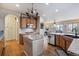 Kitchen with large island and stainless steel appliances at 2891 Canyon Crest Dr, Highlands Ranch, CO 80126