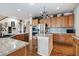 Bright kitchen, featuring an island and hardwood floors at 2891 Canyon Crest Dr, Highlands Ranch, CO 80126