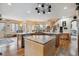Spacious kitchen with granite countertops and island at 2891 Canyon Crest Dr, Highlands Ranch, CO 80126