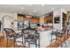 Open kitchen with island and granite countertops at 2891 Canyon Crest Dr, Highlands Ranch, CO 80126