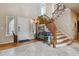 Bright and spacious entryway with staircase at 2891 Canyon Crest Dr, Highlands Ranch, CO 80126