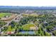 Aerial view of neighborhood with park and tennis courts at 4920 S Inca Dr, Englewood, CO 80110