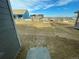 View of backyard during new construction, showing landscaping progress at 5571 Wisteria Ave, Firestone, CO 80504