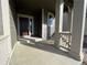 Covered front porch with access to the front door at 5571 Wisteria Ave, Firestone, CO 80504