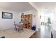 Bright home office with built-in shelving and hardwood floors at 9299 Rifle St, Commerce City, CO 80022