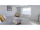 Main bedroom with ample natural light and a view at 9299 Rifle St, Commerce City, CO 80022