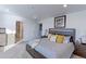 Main bedroom with plush carpeting and ensuite bathroom access at 9299 Rifle St, Commerce City, CO 80022