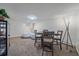 Finished basement rec room with seating and a table at 3744 Miller Ct, Wheat Ridge, CO 80033