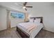 Bright bedroom with ceiling fan and neutral decor at 3744 Miller Ct, Wheat Ridge, CO 80033