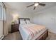 Cozy bedroom with ceiling fan and neutral decor at 3744 Miller Ct, Wheat Ridge, CO 80033