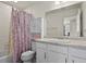 Clean bathroom with a shower/tub and white vanity at 6251 N Malaya St, Aurora, CO 80019