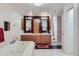 Elegant bathroom with double vanity, soaking tub and shower at 1499 Blake St # 5I, Denver, CO 80202