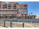 Modern multi-story brick building with large windows and city views at 1499 Blake St # 5I, Denver, CO 80202