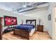 Spacious bedroom with hardwood floors and built-in shelving at 1499 Blake St # 5I, Denver, CO 80202