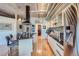 Modern kitchen with large island, stainless steel appliances, and exposed ductwork at 1499 Blake St # 5I, Denver, CO 80202