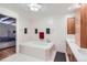 Spa-like bathroom with soaking tub and double vanity at 1499 Blake St # 5I, Denver, CO 80202