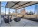 Relaxing rooftop deck with city views and seating at 1499 Blake St # 5I, Denver, CO 80202