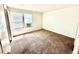 Spacious bedroom with neutral carpeting and ample closet space at 16001 E Alaska Pl # 7, Aurora, CO 80017