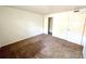 Bright bedroom with neutral walls, carpeting, and a large closet at 16001 E Alaska Pl # 7, Aurora, CO 80017