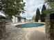 Community pool with a pool cover at 16001 E Alaska Pl # 7, Aurora, CO 80017