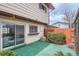 Small back patio with sliding glass door access at 404 S Carr St, Lakewood, CO 80226