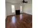 Living room with hardwood floors and a fireplace at 2217 S Telluride Ct, Aurora, CO 80013