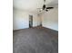 Bright main bedroom with ceiling fan and carpet flooring at 2217 S Telluride Ct, Aurora, CO 80013