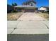 Two-story house with a brick front and attached garage at 2217 S Telluride Ct, Aurora, CO 80013