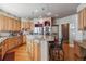 Open kitchen boasting a large island and stainless steel appliances at 10834 Bobcat Ter, Lone Tree, CO 80124