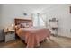 Bedroom with bed, nightstand and window at 10834 Bobcat Ter, Lone Tree, CO 80124