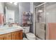 Bathroom with shower, vanity, and toilet at 10834 Bobcat Ter, Lone Tree, CO 80124