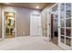 Basement hallway with access to bathroom and bedroom at 10834 Bobcat Ter, Lone Tree, CO 80124