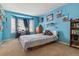 Spacious bedroom with large window and built-in shelving at 10834 Bobcat Ter, Lone Tree, CO 80124