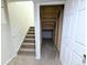 Unfinished basement with stairs and ample storage space at 18739 E Linvale Cir, Aurora, CO 80013