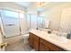 Bathroom boasts dual sinks, a tub, and a shower at 18739 E Linvale Cir, Aurora, CO 80013