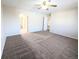 Bright bedroom with ceiling fan and access to bathroom at 18739 E Linvale Cir, Aurora, CO 80013