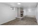 Basement features a cozy brick fireplace at 1845 W 46Th Ave, Denver, CO 80211