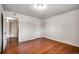 Bright bedroom with hardwood floors and closet at 8335 Fairmount Dr # 9-206, Denver, CO 80247